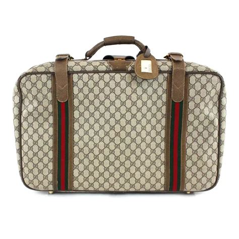 gucci konsol|Gucci luggage sale.